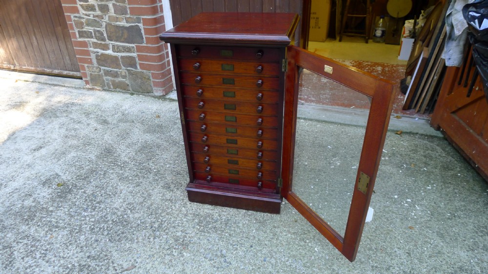 A 12 DRAWER WATKINS & DONCASTER MAHOGANY AND DEAL COLLECTORS CABINET CIRCA 1890 IN ORIGINAL CONDITION. View IX