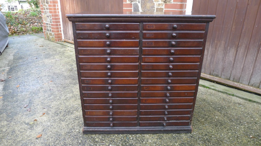 A VERY VERSATILE 30 DRAWER VICTORIAN COLLECTORS CABINET IN STAINED AND POLISHED DEAL. CIRCA 1890. View III