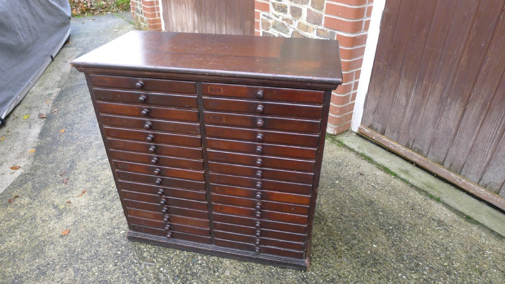 A VERY VERSATILE 30 DRAWER VICTORIAN COLLECTORS CABINET IN STAINED AND POLISHED DEAL. CIRCA 1890. View IV