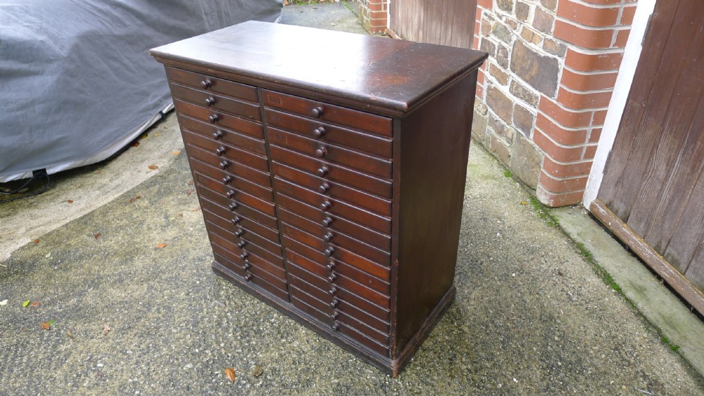 A VERY VERSATILE 30 DRAWER VICTORIAN COLLECTORS CABINET IN STAINED AND POLISHED DEAL. CIRCA 1890. View V