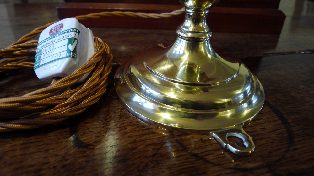 A BRASS GIMBALLED MARITIME LAMP CIRCA 1910. View III