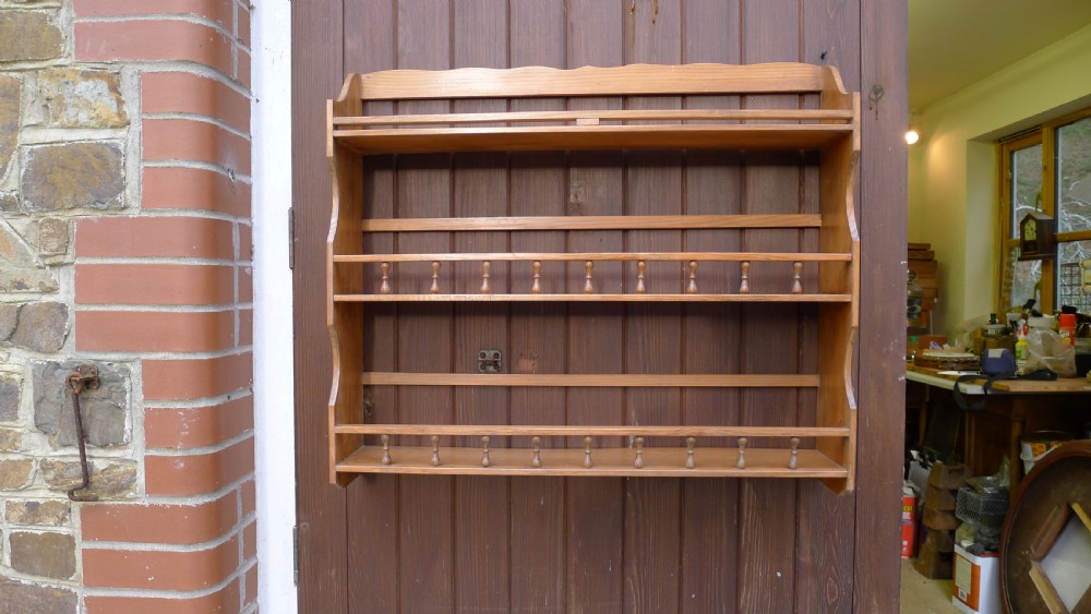 A VICTORIAN DEAL HANGING BOOK SHELF OR DISPLAY RACK. CIRCA 1890. View IV