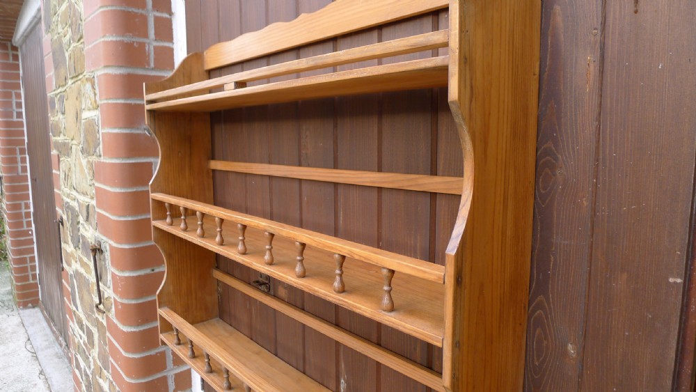 A VICTORIAN DEAL HANGING BOOK SHELF OR DISPLAY RACK. CIRCA 1890. View V