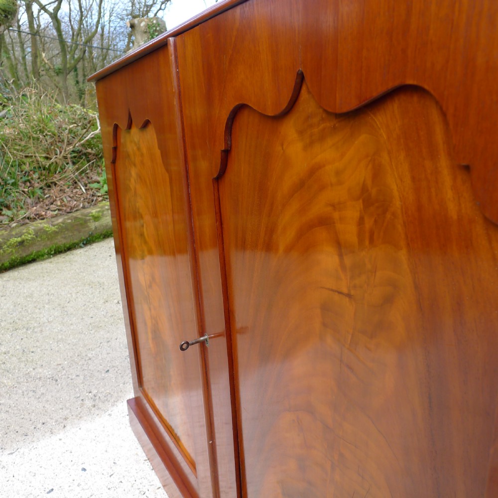 A GOOD AND HIGHLY VERSATILE HONDURAS MAHOGANY COLLECTORS CABINET CIRCA 1870. View V