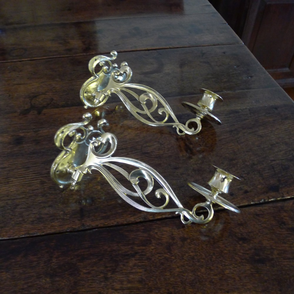 A BEAUTIFUL PAIR OF BRASS, SWING OUT PIANO CANDLE HOLDERS. CIRCA 1890. View IV