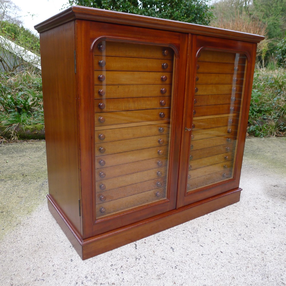 A 30 DRAWER SOLID MAHOGANY DE-LUXE COLLECTORS CABINET BY J.T.CROCKETT. CIRCA  1890.