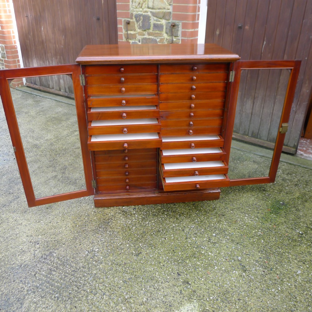 A GOOD 30 DRAWER WATKINS & DONCASTER COLLECTORS SPECIMEN CABINET IN SATIN WALNUT AND MAHOGANY. CIRCA 1900 View X
