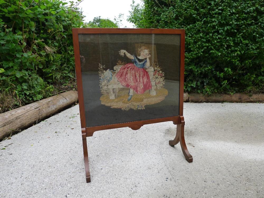 A BEAUTIFUL PETIT POINT EMBROIDERED TAPESTRY WALNUT FRAMED FIRE SCREEN CIRCA 1880.