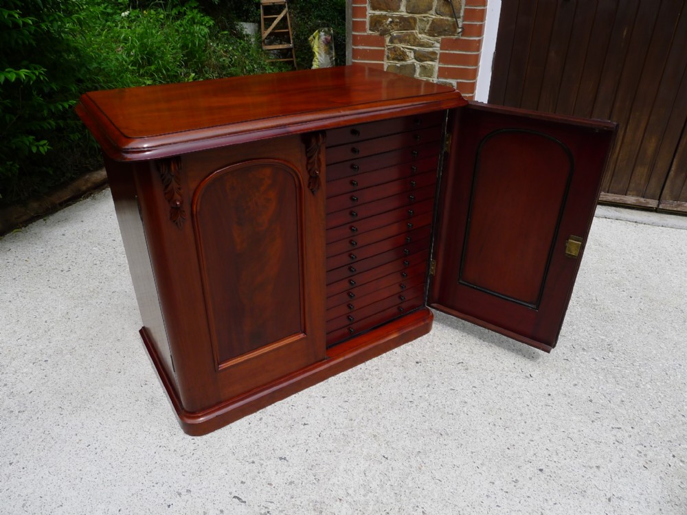 A SUPER VICTORIAN MAHOGANY 30 DRAWER COLLECTORS CABINET. CIRCA 1870.