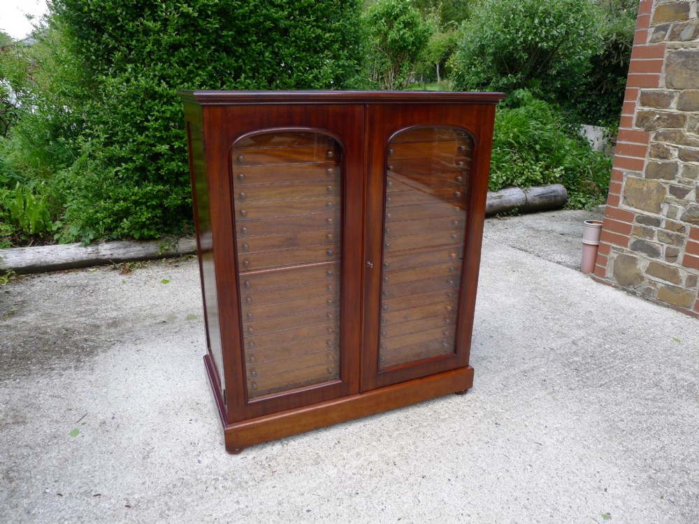 FOR THE CONNOISSEUR, A SUPERB AND RARE 36 DRAWER BRADY COLLECTORS CABINET. CIRCA 1900.