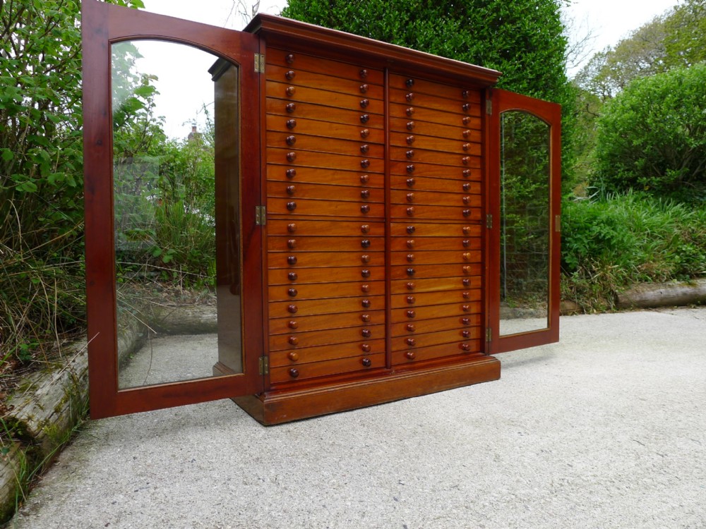 A SOLID MAHOGANY 40 DRAWER COLLECTORS CABINET OF SPECTACULAR QUALITY. CIRCA 1900