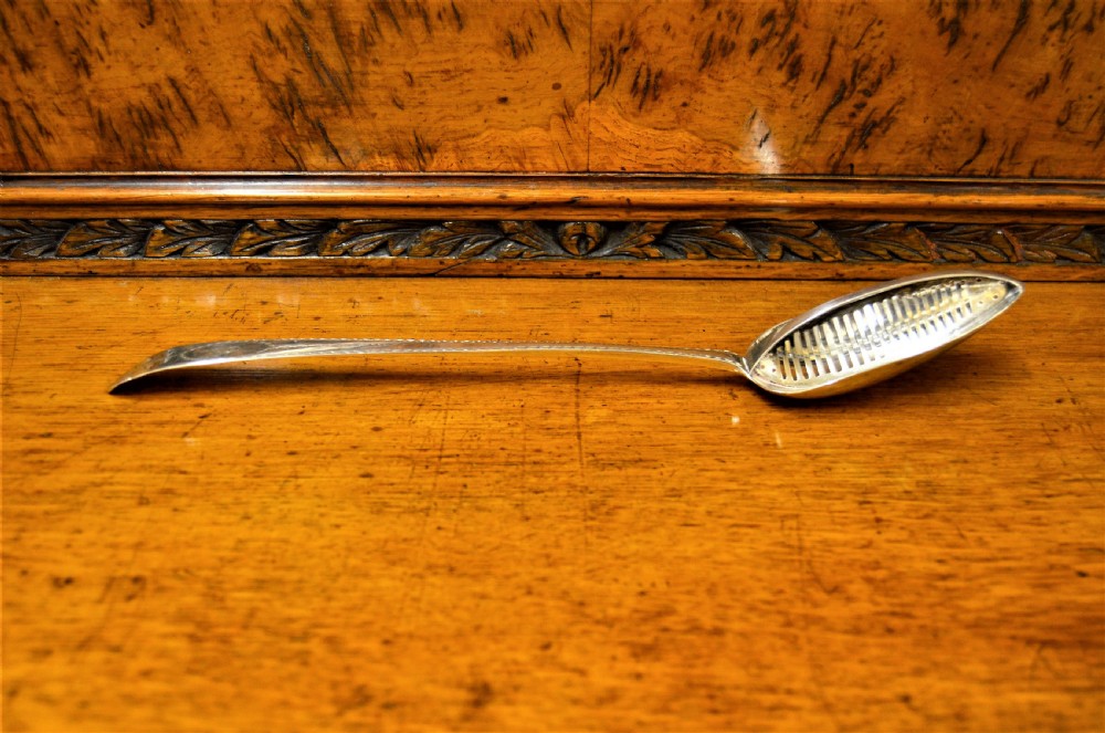 Irish silver strainer spoon