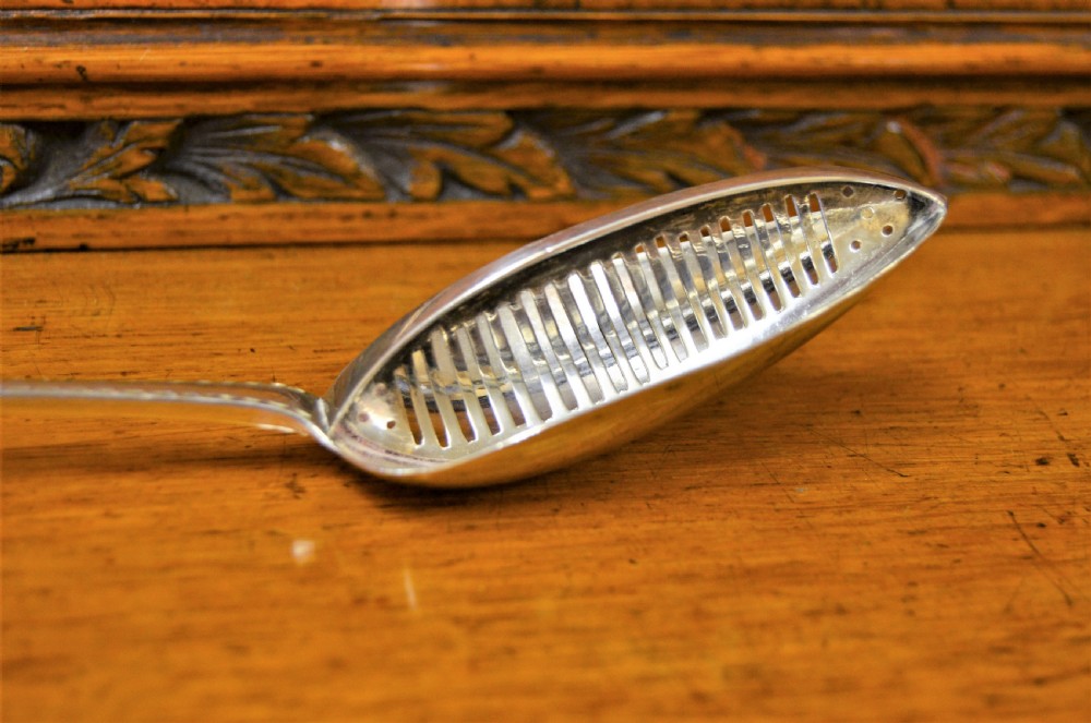 Irish silver strainer spoon View VI