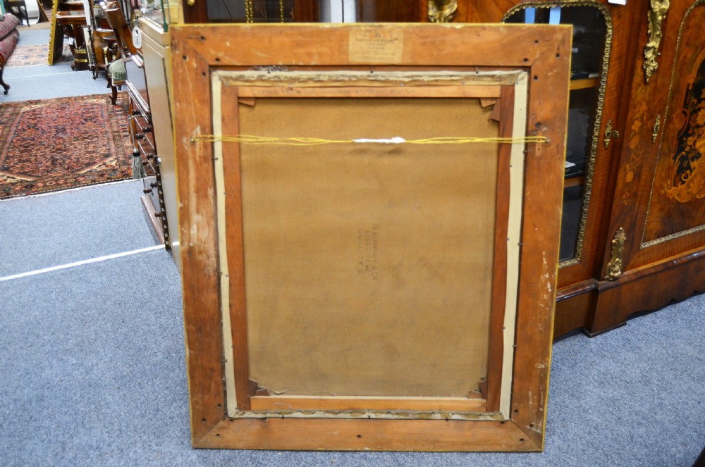 A pair of 19th-century oil portraits depicting male subjects in elaborate attire, enclosed within ornate, heavily carved gilt frames. View VIII