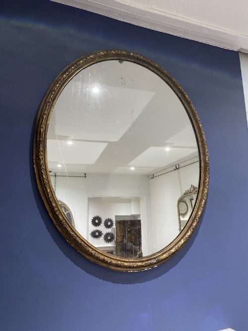 OVAL GILTWOOD MIRROR WITH DARK GILDING CIRCA 1880 - ADDITIONAL PHOTO 1