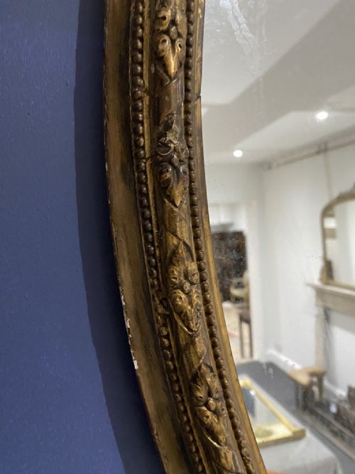 OVAL GILTWOOD MIRROR WITH DARK GILDING CIRCA 1880 - ADDITIONAL PHOTO 2