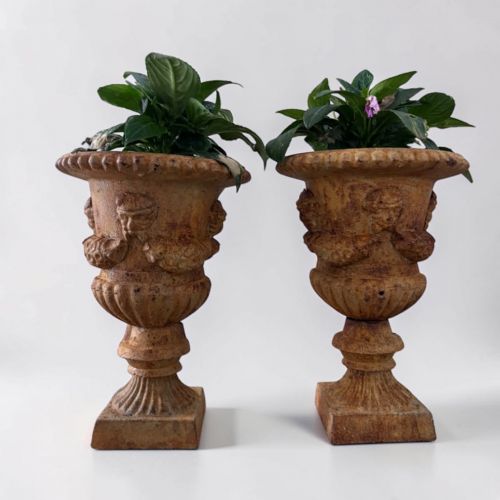 PAIR OF 19TH CENTURY CAST IRON URNS