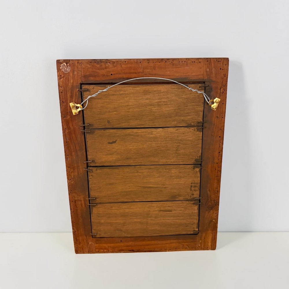 A rectangular late 19th-century Anglo-Indian wall mirror with floral bone inlay patterns surrounding a reflective glass plate. View III
