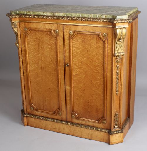 fig 1. Fine pair of mid-nineteenth century birds'-eye maple and parcel-gilt side-cabinets