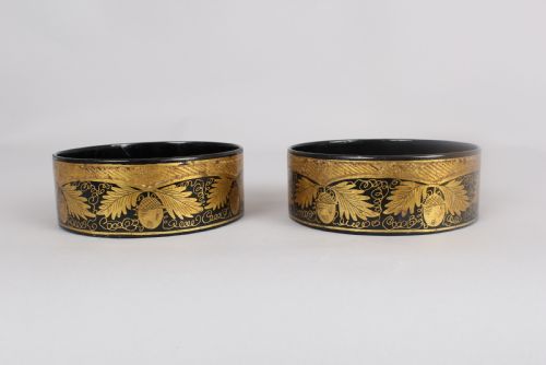 Pair of Regency Black and Gilt Papier-mache Coasters