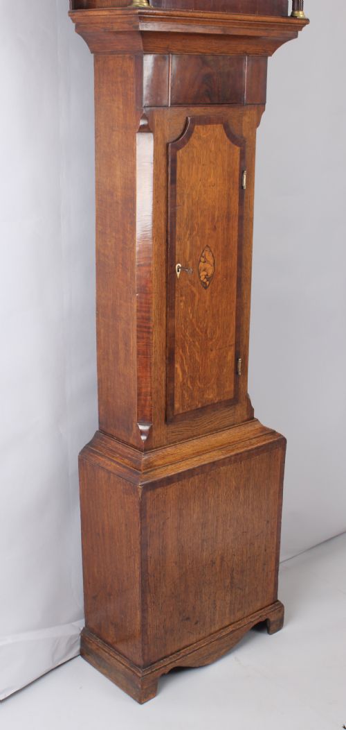 fig 1. Early nineteenth century golden-oak and mahogany long-case clock by John Wilson of Peterborough