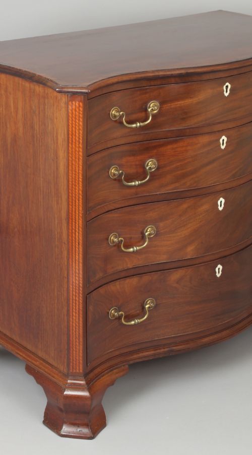 fig 2. Fine George III period mahogany serpentine dressing-chest of small proportions