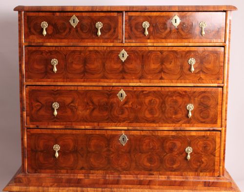 fig 1. A fine and rare walnut oyster-piece chest-on-stand