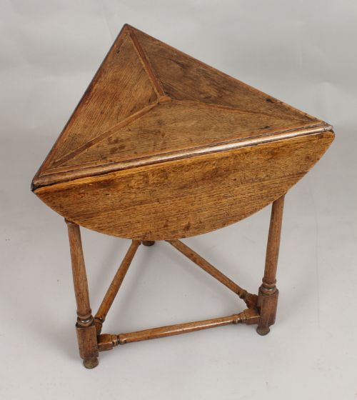fig 1. Rare early 18th century oak 'cricket' table