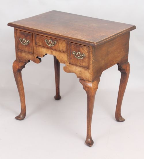 fig 1. George II period walnut and oak lowboy