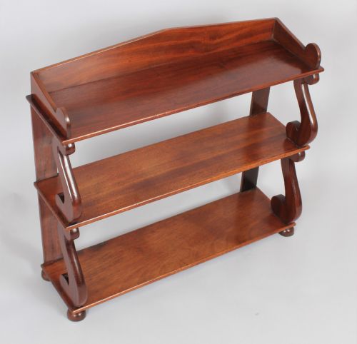 A Regency Set of Mahogany Hanging Shelves
