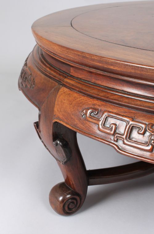 fig 1. A 19th century Chinese hardwood circular 'Opium' table