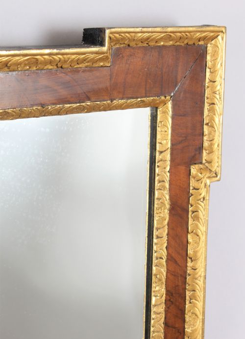 fig 1. An 18th century walnut and gilt slip rectangular mirror