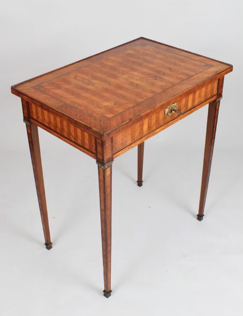 fig 1. An elegant 18th century French kingwood writing table