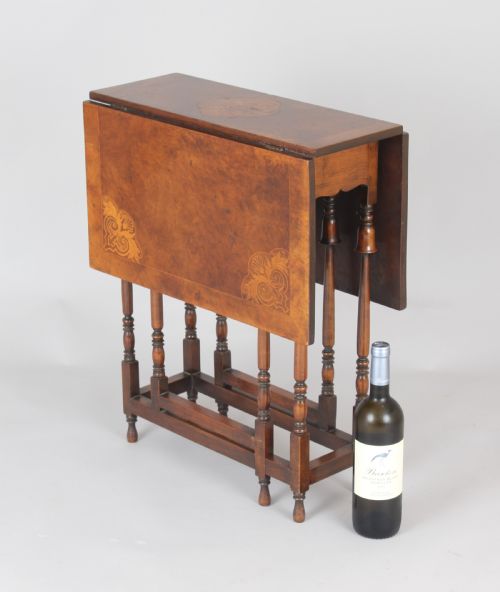 fig 1. Edwardian burr walnut and parquetry Sutherland table of rare form