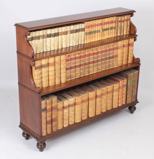 fig 1. George III mahogany open waterfall book shelves of fine quality
