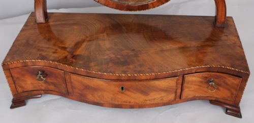 fig 1. George III period mahogany toilet mirror of good figure and colour