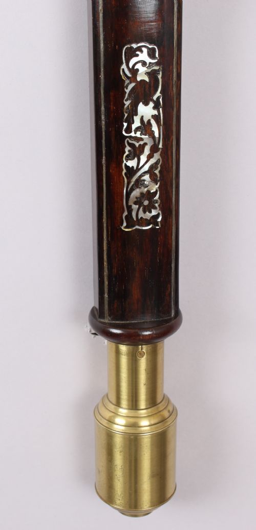 fig 1. A bow-fronted marine barometer in a well-figured rosewood case
