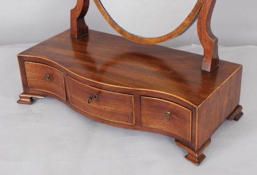 fig 1. George III period mahogany toilet mirror of good figure and colour