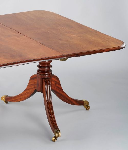 fig 1. George IV period mahogany twin-pedestal dining-table of good mellow colour