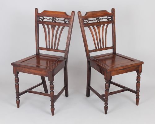 A RARE PAIR OF LATE NINETEENTH CENTURY CHINESE PADOUK HALLCHAIRS