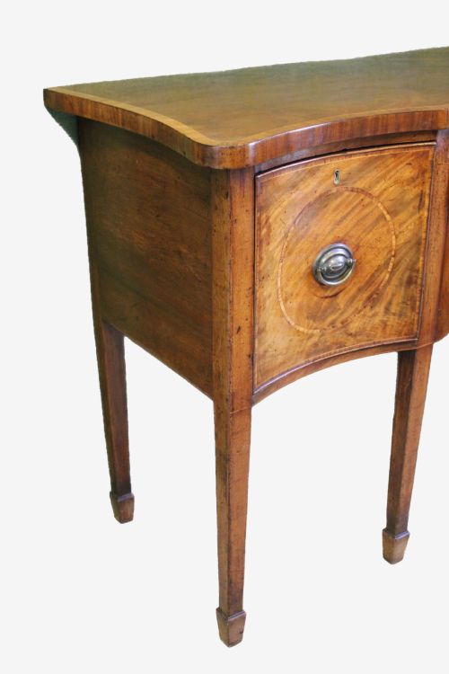 fig 1. A Hepplewhite period mahogany serpentine fronted sideboard of delightfully small proportions