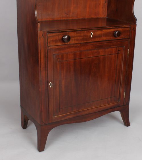 fig 1. George III period mahogany cupboard base water fall bookshelves