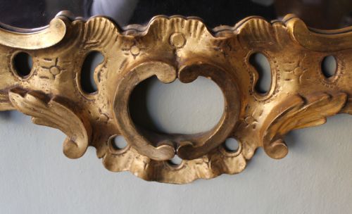 fig 1. A carved and gilt wood mirror in the manner of Matthias Lock (c1710 – 1765)