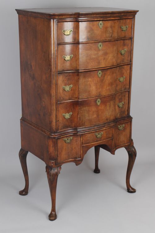 Queen Anne Revival Walnut Chest on Stand with a Shaped Front