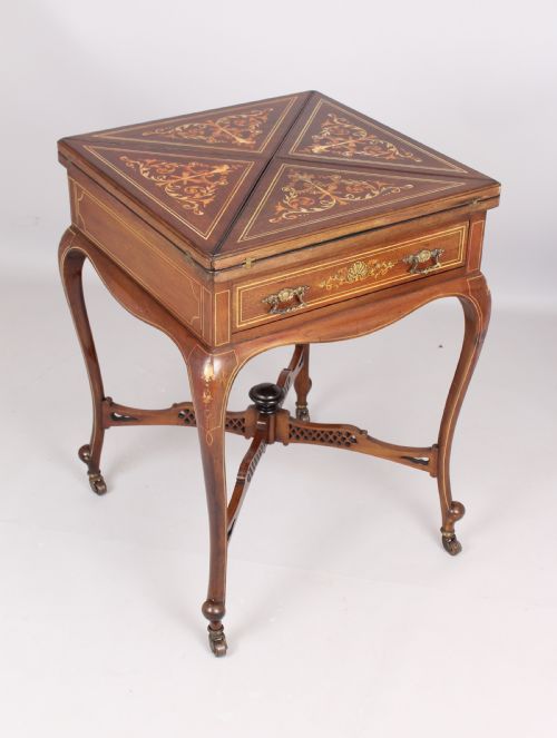 EDWARDIAN MAHOGANY ENVELOPE TABLE
