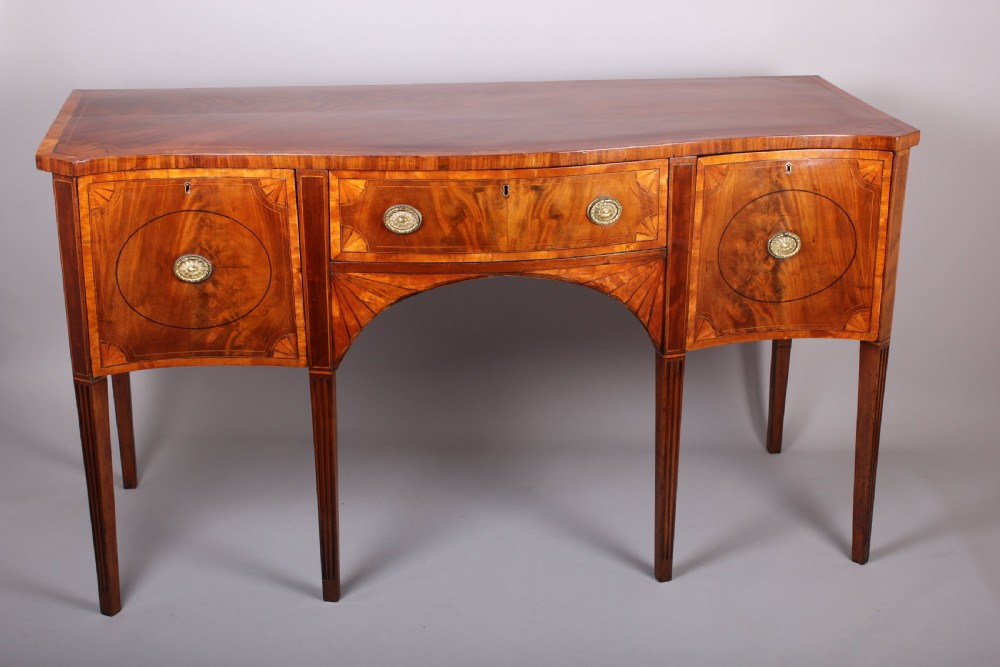 George III Period Mahogany and Satinwood Banded Serpentine-fronted Sideboard View III