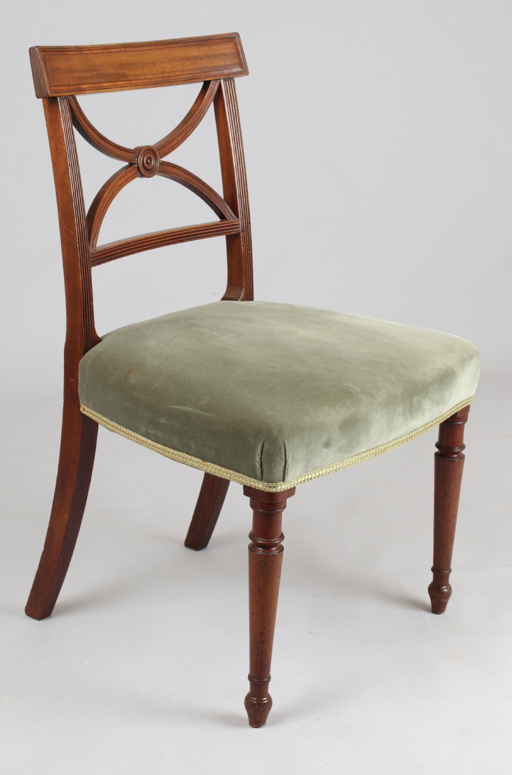 Set of eight George III period mahogany dining-chairs View III