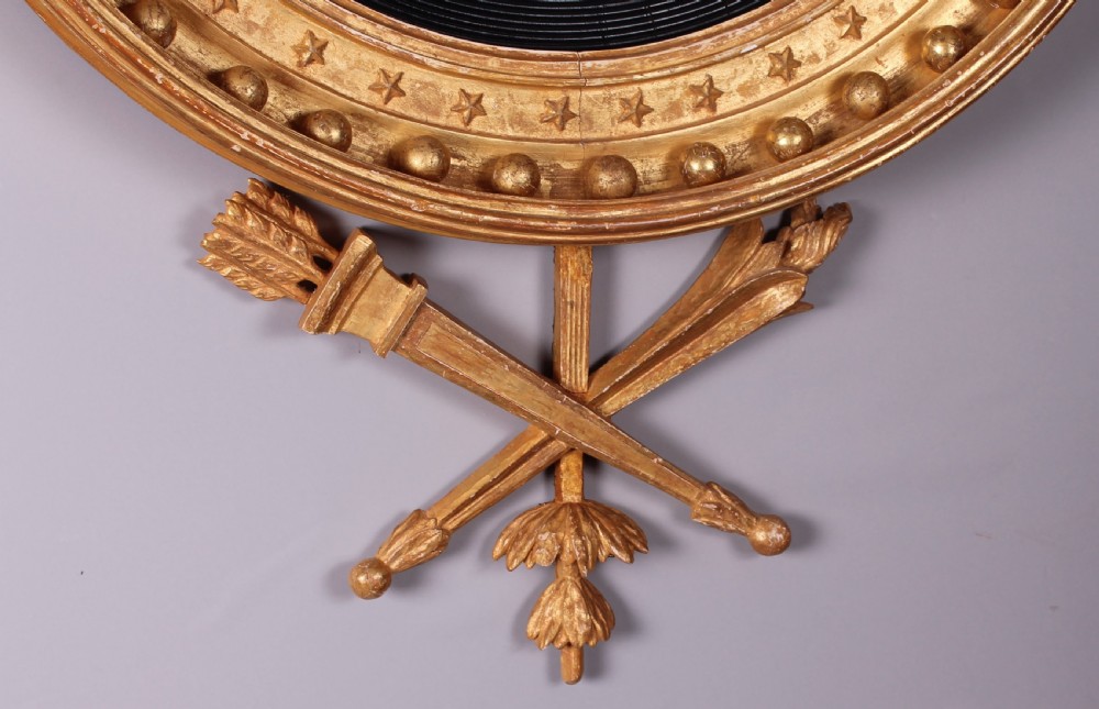 Regency period carved and gilded convex mirror View III