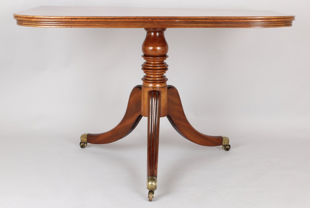 George IV period mahogany twin-pedestal dining-table  View II