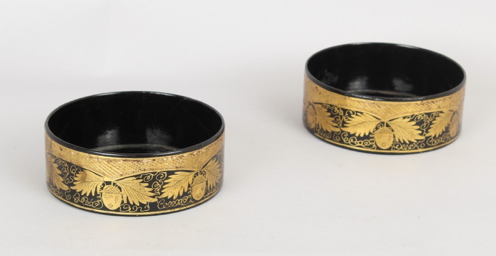 Pair of Regency black and gilt papier-mache coasters View II